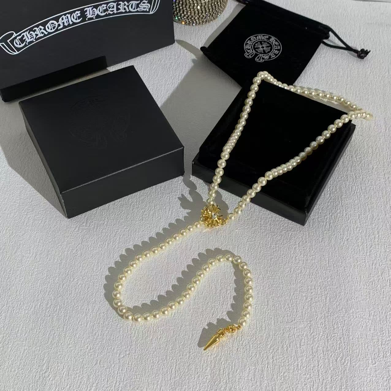 Chrome Hearts Elegant Pearl Necklace with Gold Clasp